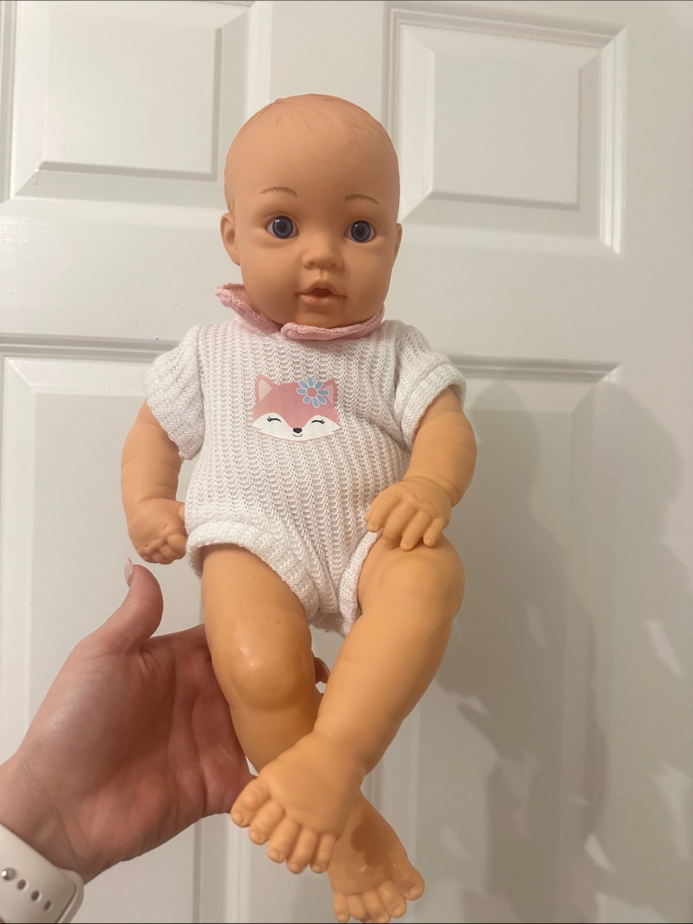 Soft Baby Doll with White Knit Romper and Pink Fox Accent